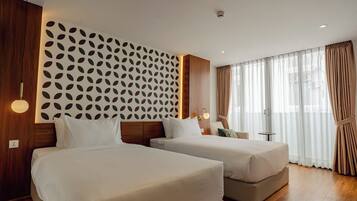 Deluxe Twin Room, Balcony, City View | In-room safe, desk, free WiFi, bed sheets