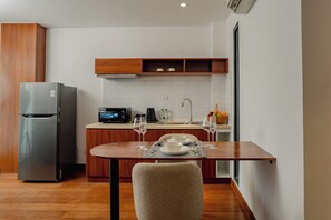 Phòng Suite Executive, ban công, quang cảnh thành phố | Bếp riêng
