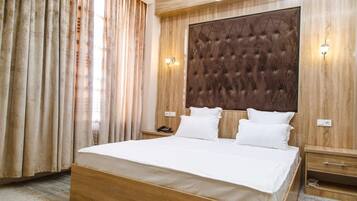 Deluxe Double Room, Balcony, Courtyard View | In-room safe, desk, laptop workspace, blackout curtains