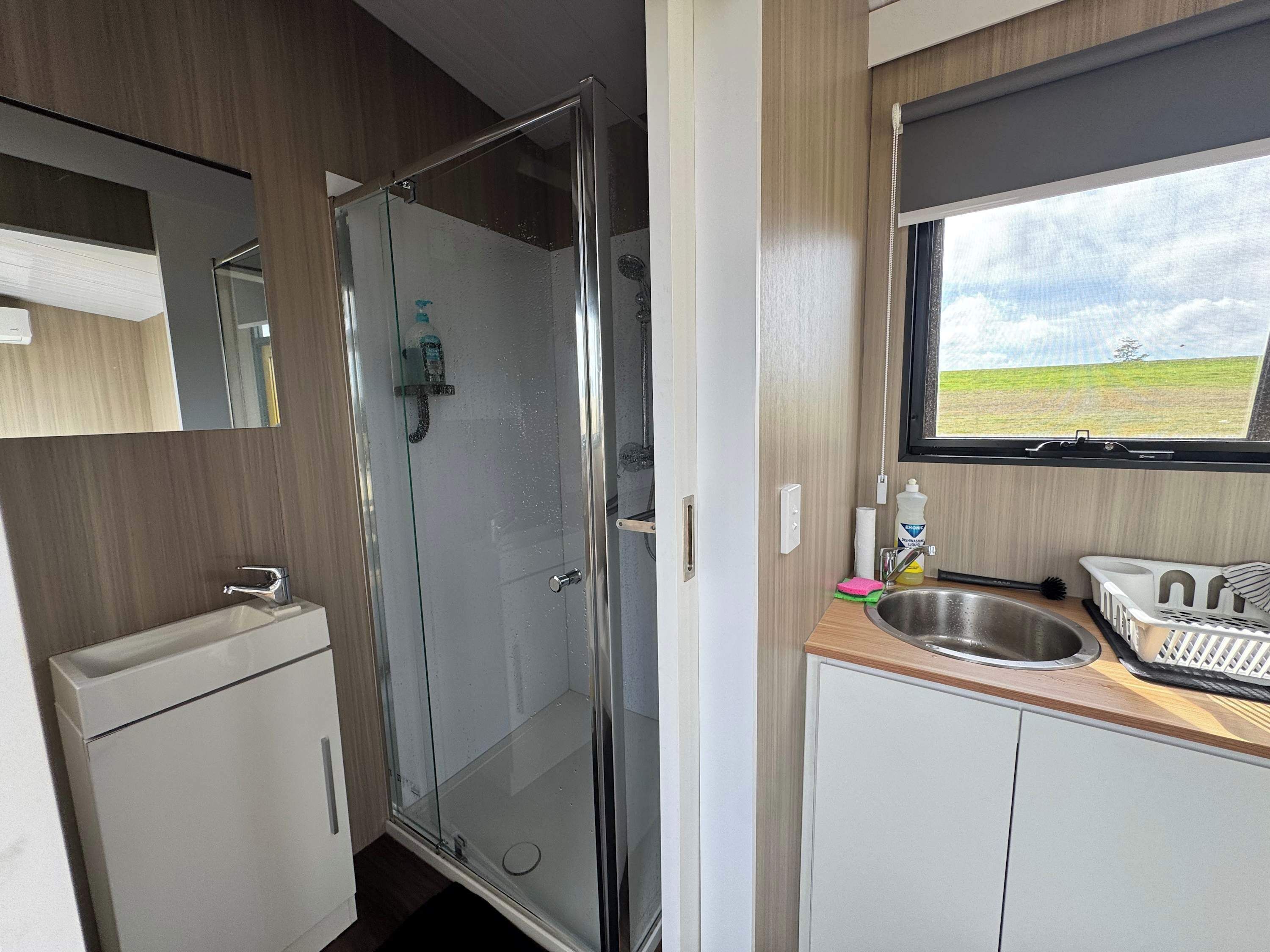 Shower, hair dryer, towels, shampoo