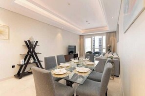 Luxury Apartment, Balcony, City View | In-room dining - Vogue | Mon Reve Downtown near Dubai Mall | Burj Khalifa (Dubai)