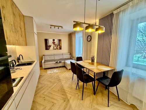 Fly Apartment Modlin by JumpInHere