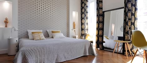 1 bedroom, desk, iron/ironing board, travel crib