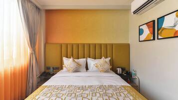 Executive Double Room, City View | In-room safe, desk, laptop workspace, blackout drapes