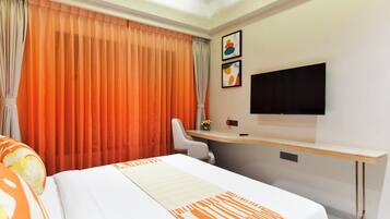 Executive Double Room, City View | In-room safe, desk, laptop workspace, blackout drapes