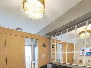 Signature Condo, 1 Bedroom, Non Smoking, City View | Living room - Urban Oasis at A&K Vibes City-View Condo (Quezon City)