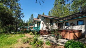 A house with a hot tub, a porch, and a garden. - On 10 Acres! Serene Nevada City Retreat w/ Hot Tub (Nevada City)