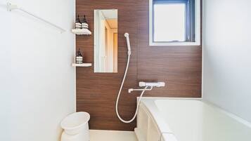 Hair dryer, bidet, towels, soap