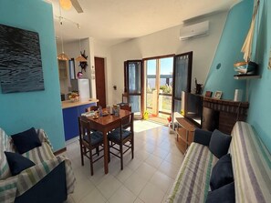 Apartment, 2 Bedrooms | Living room - Accommodation Just Steps Away From Cala Lupo (Stintino)