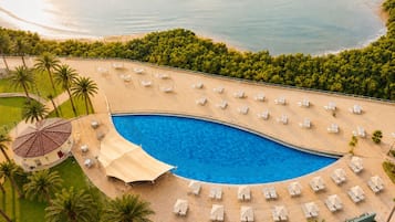 Outdoor pool, open 7:00 AM to 8:00 PM, pool umbrellas, sun loungers