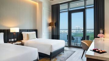 Premium bedding, down duvets, memory-foam beds, in-room safe