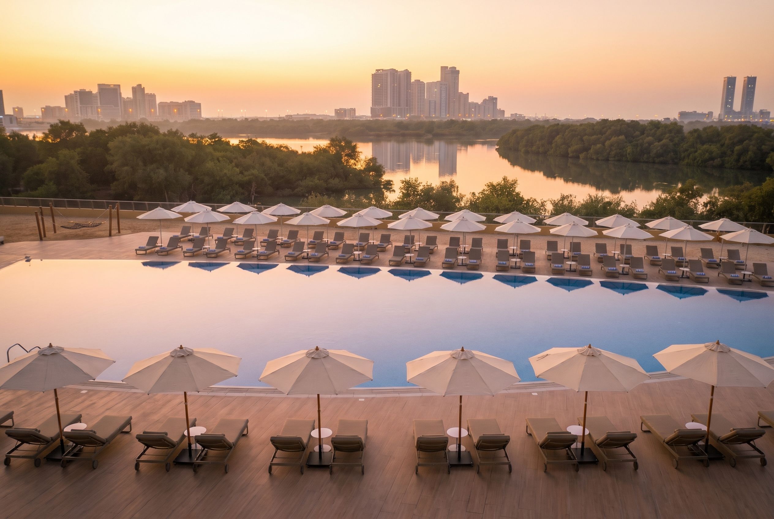 Outdoor pool, open 7:00 AM to 8:00 PM, pool umbrellas, sun loungers
