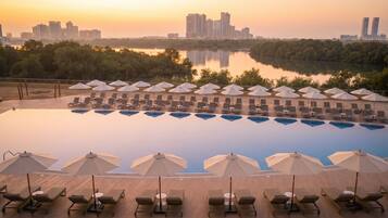 Outdoor pool, open 7:00 AM to 8:00 PM, pool umbrellas, sun loungers