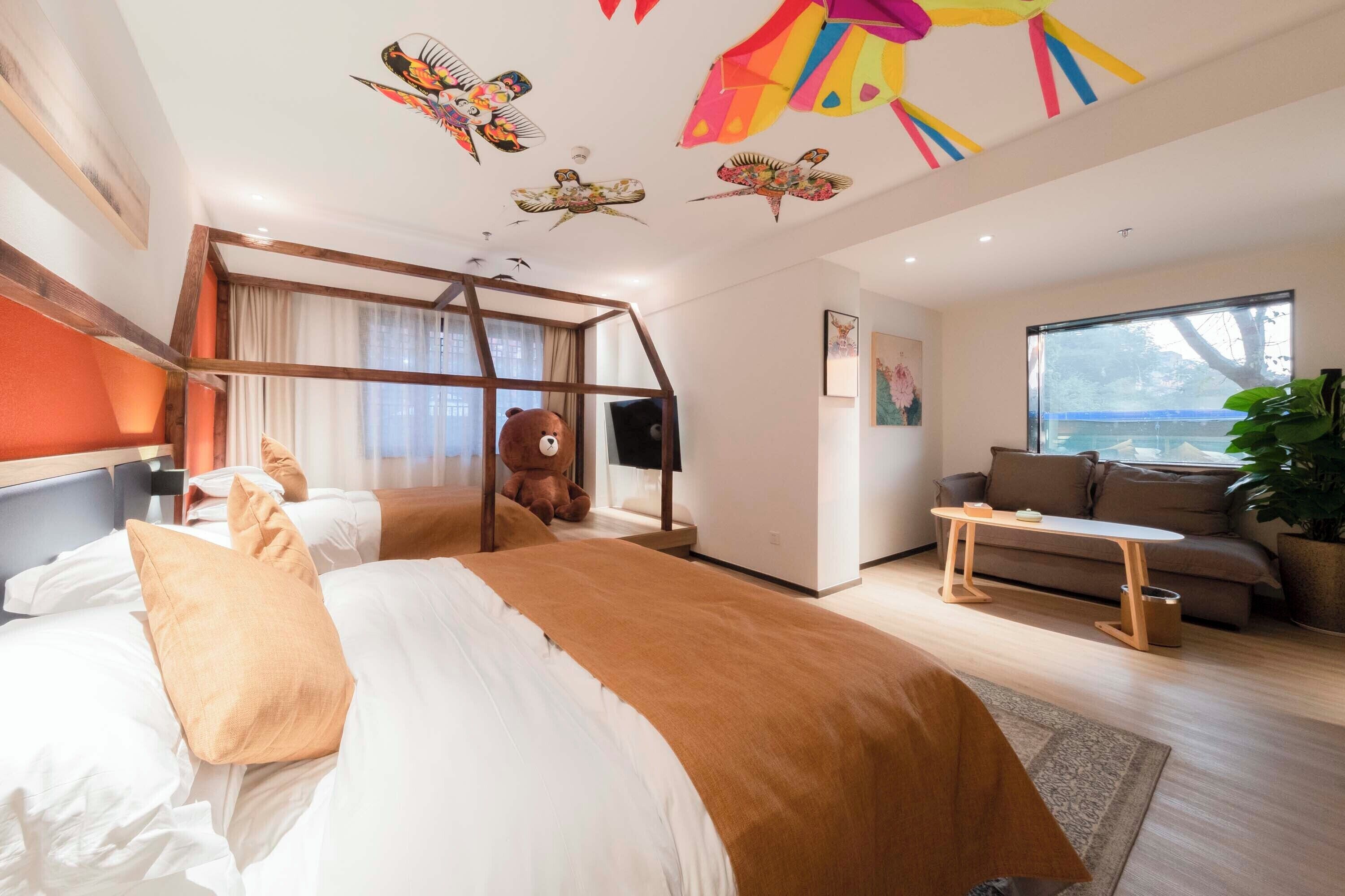 家庭套房, 庭院景观 | 高档床上用品、迷你吧、特色装修、特色家居