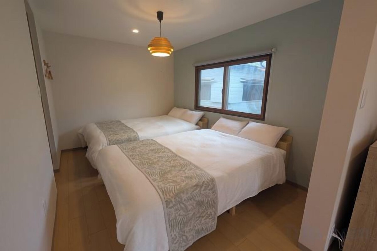 Blackout curtains, iron/ironing board, travel cot