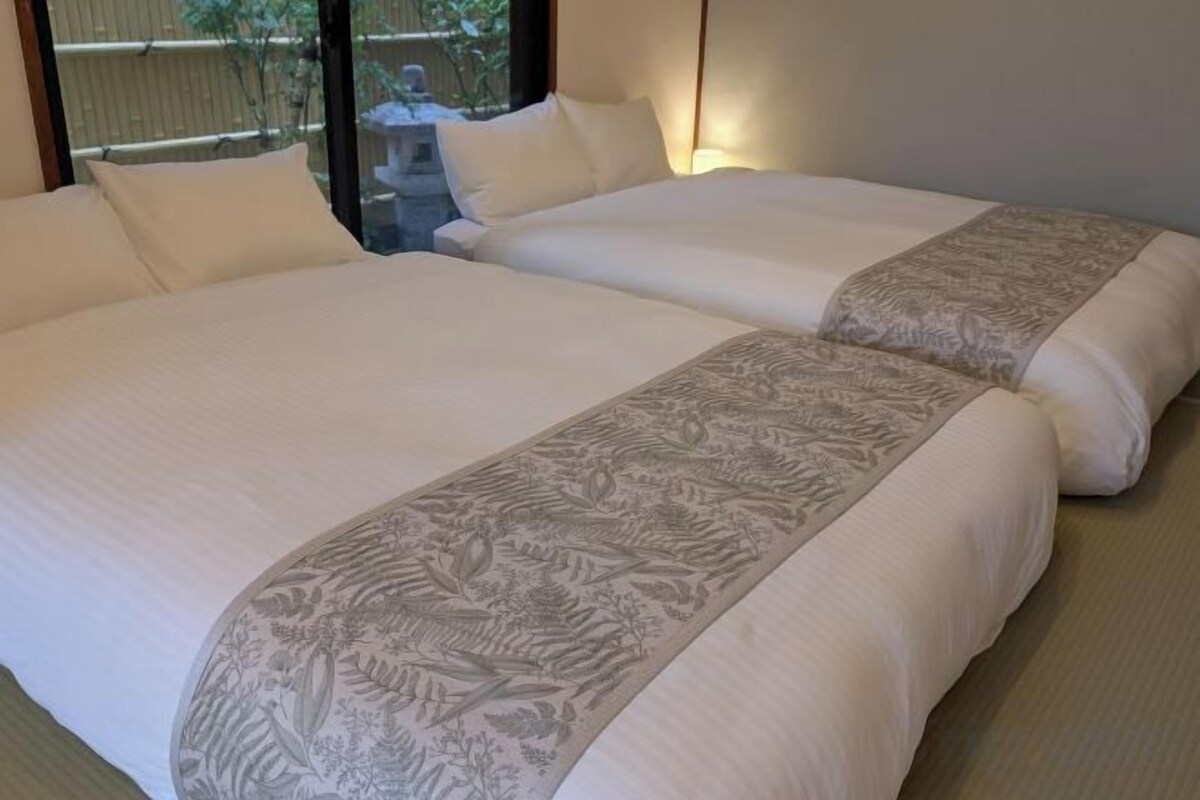 Blackout curtains, iron/ironing board, travel cot