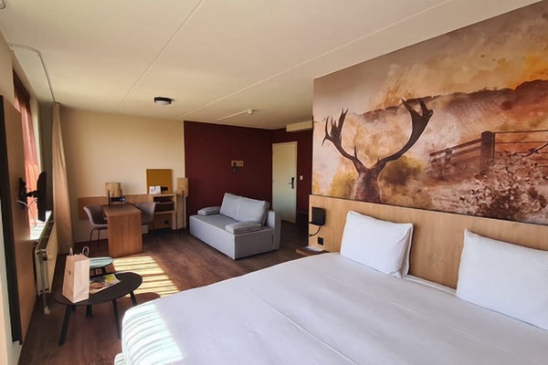 Wake up to sunny comfort in a stylish, spacious bedroom.