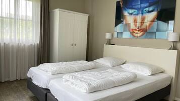 4 slaapkamers, een strijkplank/strijkijzer, gratis wifi, beddengoed