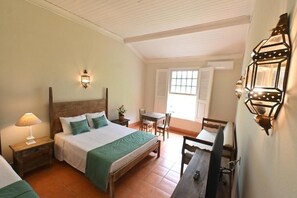 Deluxe fyrbäddsrum - utsikt mot trädgården | Utsikt från rummet