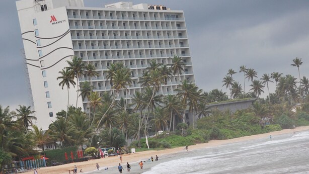 A hotel with a modern design, featuring a prominent Marriott logo. The building has multiple floors with balconies. - Dominic's Home by Interhome (Weligama)