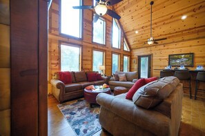 TV, fireplace - Pet Friendly Cabin | Walk to Breweries | Hot Tub (Broken Bow)