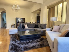 Living area - "Classic Style apart". by Interhome (Abu Al Feda)