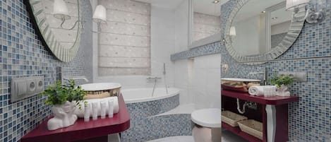 Shower, hair dryer, towels, shampoo
