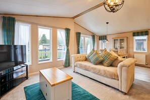 TV, fireplace, offices - Host & Stay | Sandy Lane Lodge (Pocklington)