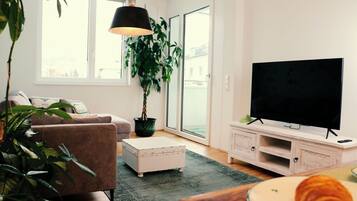 Comfort-Apartment, Stadtblick | Wohnbereich