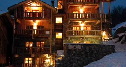 Penthouse views of the Peaks and the Piste