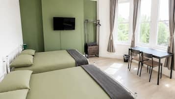 Family Quadruple Room | Desk, laptop workspace, iron/ironing board, free WiFi
