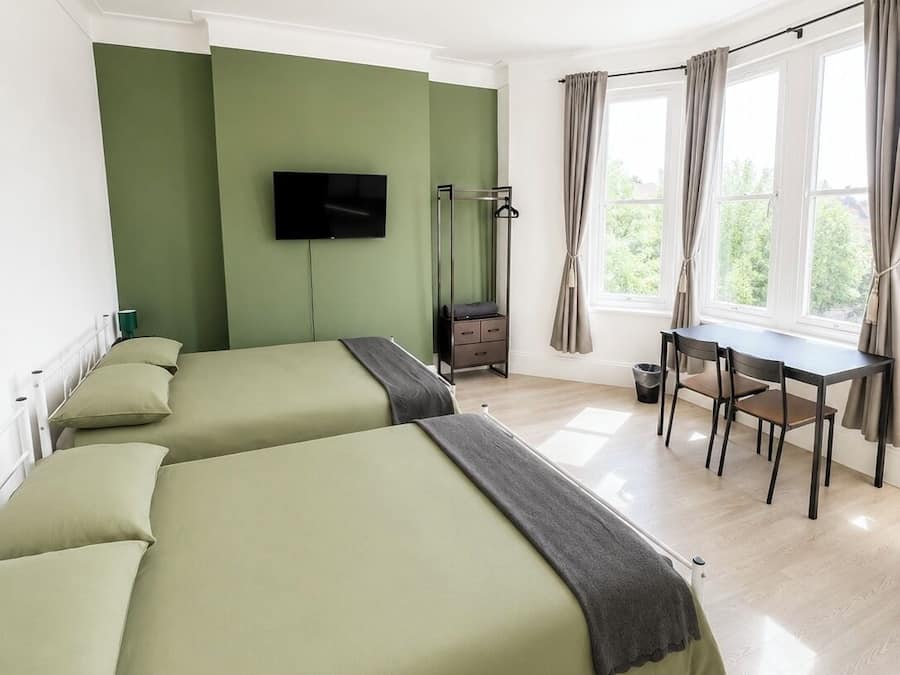 Family Quadruple Room | Desk, laptop workspace, iron/ironing board, free WiFi