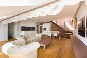 Attic apartment with 2 bedrooms, a sauna, and a shower AP5 | Living area - Wellness Hotel Republika 24 (Plzeň)