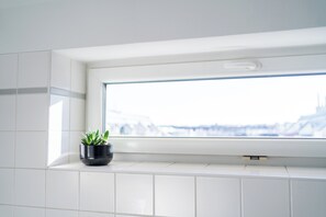 Appartement, 1 queensize bed met slaapbank, keuken, uitzicht op de stad | Interieur