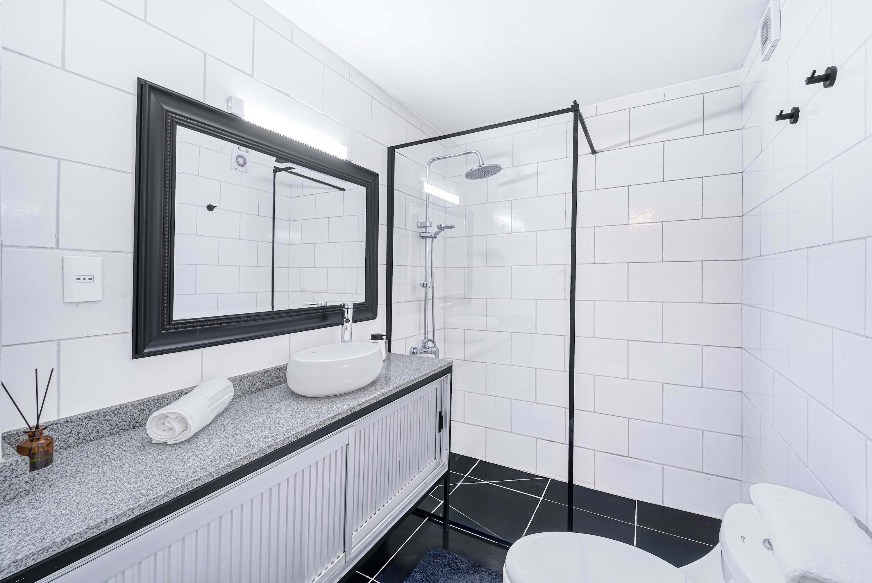Shower, hair dryer, towels