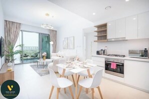 Luxury Apartment, Balcony, City View | Private kitchen | Full-sized fridge, microwave, oven, stovetop - Vogue | Downtown with Direct Access to Dubai Mall (Dubai)