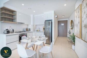 Luxury Apartment, Balcony, City View | In-room dining - Vogue | Downtown with Direct Access to Dubai Mall (Dubai)