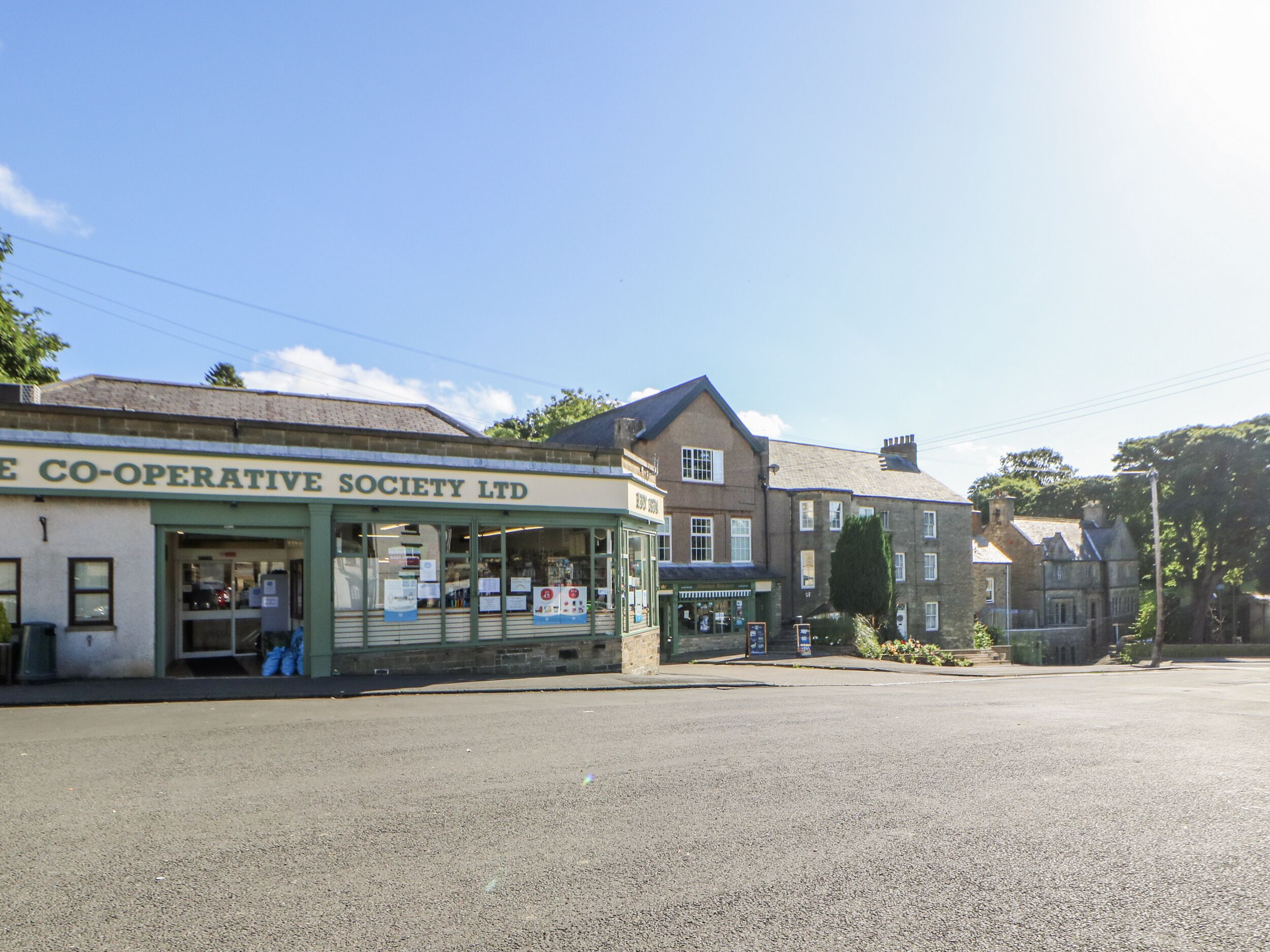 A building with a sign reading "Co-operative Society Ltd."