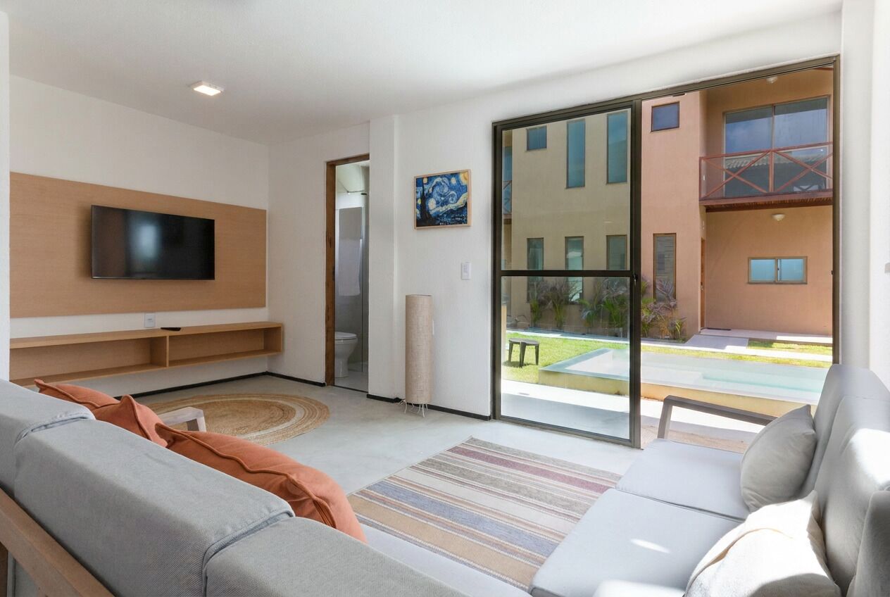 Basic Bungalow | Living area | Flat-screen TV