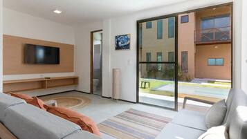 Basic Bungalow | Living area | Flat-screen TV