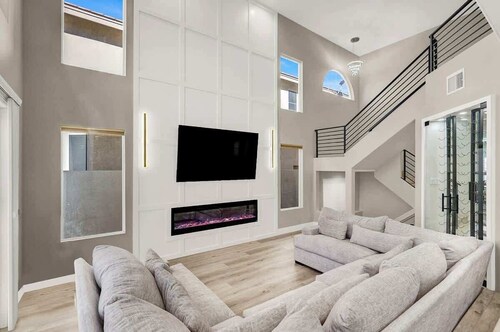 Luxe 5BR Home w/ Pool, BBQ, EV Charger Near Strip!