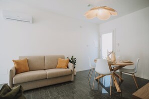 Kondominium Keluarga, 1 Tempat Tidur Double dengan tempat tidur Sofa, dapur kecil | Tempat makan