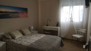 6 dormitorios, tabla de planchar con plancha, wifi y ropa de cama