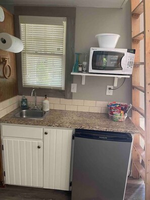 Fridge, microwave, coffee/tea maker, toaster