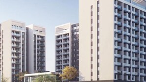 A modern high-rise building with multiple balconies, likely a residential or hotel structure. - 1BR Luxury Suites near Airport with pool/gym/Cityview (Nairobi)