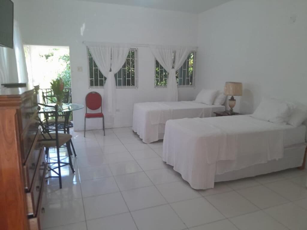Twin Room, Balcony, Garden View | In-room safe, iron/ironing board, free WiFi