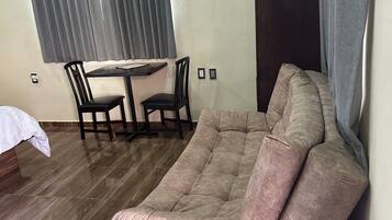 Family Quadruple Room | Living area