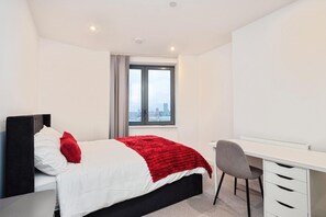 1 slaapkamer, een strijkplank/strijkijzer, wifi, beddengoed