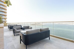 Terrace/patio - Designer 1BR at Emaar Beachfront | Beach Access (Dubai)