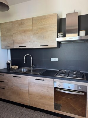 Private kitchen - House surrounded by olive grove 900mt from the sea (Orosei)